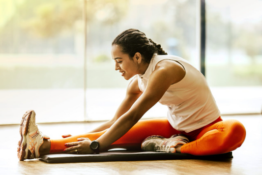 Woman doing standing calf raise exercise for strong calves.