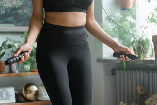Woman preparing for cardio exercises after weight training